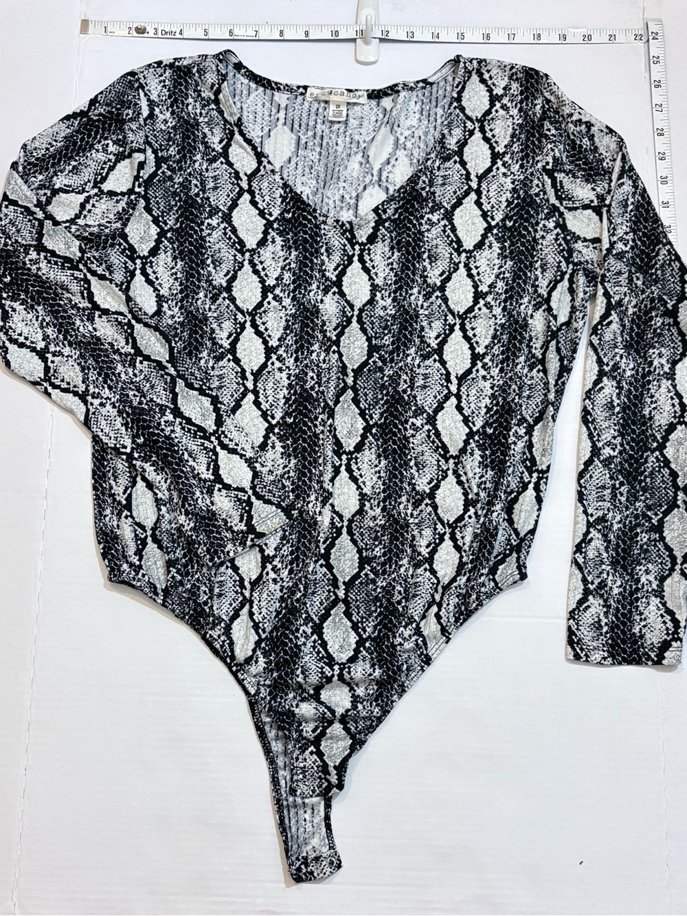 eye candy Black & White Speckled Knit Body Suite 2x long sleeve